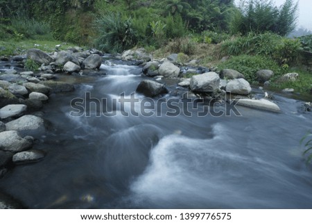 upstream of the Serayu River which is full of rock with soft water in Wonosobo, Central Java