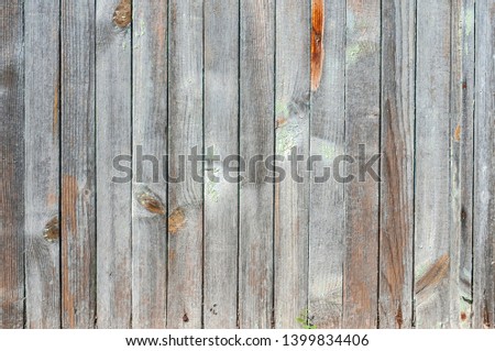 Old weathered grunge wooden boards fence wall surface closeup as wooden background