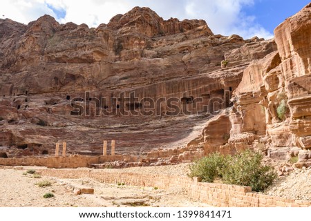 Stunning view of a huge temple carved in stone in the beautiful Petra site. Petra is a Unesco World heritage site, historical and archaeological city in southern Jordan.