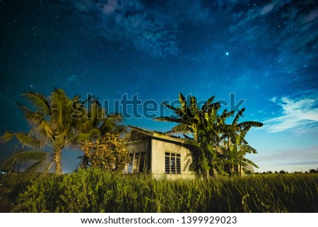 Cloudy Moonset at rice fields 