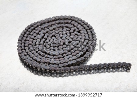 new, metal chains on white ground