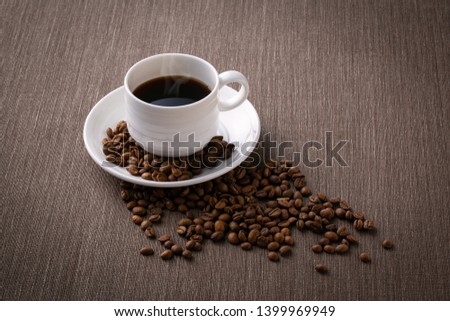 Hot coffee and coffee beans