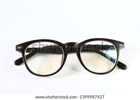 Cool sunglasses formal with black plastic frame isolated on white background, top view