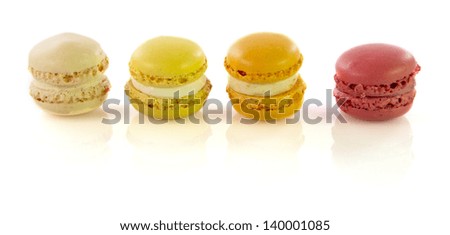 Delicious macaroons on an isolated white background