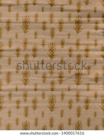 Natural brown craft paper with floral pattern cardboard background