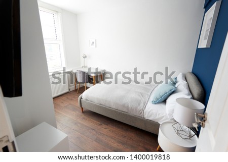 Modern bedroom, seen from doorway