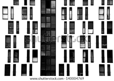 The photograph of a facade with symmetrically arranged windows/window facade
