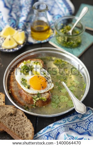 Sopa Alentejana - garlic soup with bread and egg from Portugal