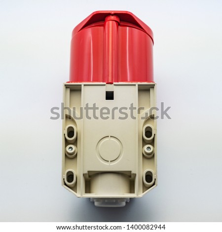 The photo on a white background electrical plug and socket for connecting wires for mounting electrics. Perfect for filling the catalog of a modern iniernet store on the site. Studio photo.