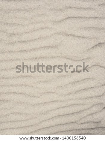 Close up of sand on a beach on a sunny day using as natural background