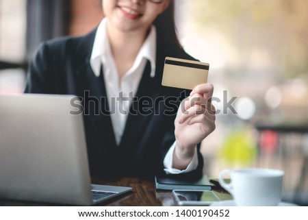 Businessman working on financial business via laptops and credit cards