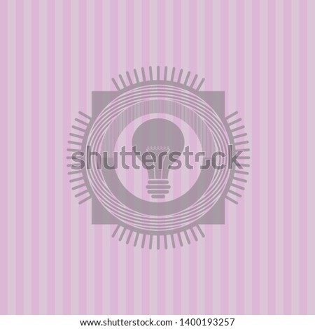 light bulb icon inside retro style pink emblem