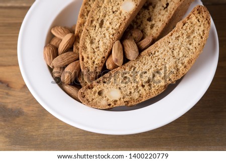 Tasty Traditional Italian Sweets Biscotti or Cantucci on White Plate Wooden Background Italian Biscotti for Coffee or Wine Italian Snack