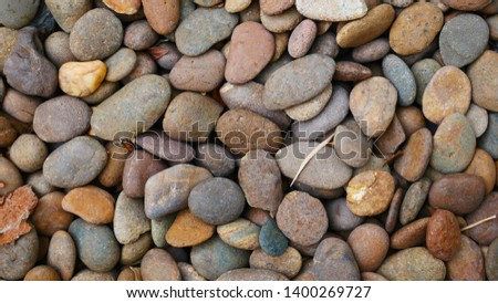 pebbles beach stone texture background, color pebble stone background
