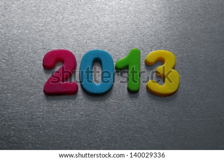 2013 spelled out using colored fridge magnets
