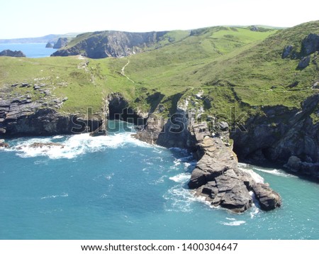 a picture of a rocky coastline and cliffs of the south coast of England taken in the summer