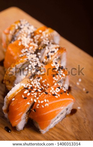 Traditional Japanese cuisine. Sushi restaurant menu. Rolls maki with tuna, eel and avocado.