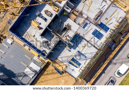 Construction site and equipment - aerial view. Residential Building