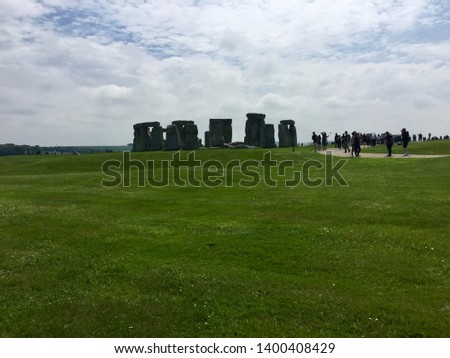 Distant view of Stonehenge and its crowd of visitors