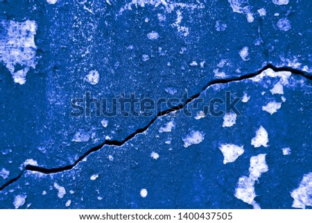 Blue paint cement wall background and texture rupture