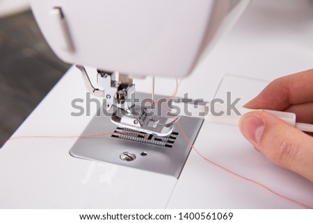working with a sewing machine