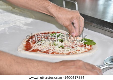 Cheese pizza, heart shaped dish
