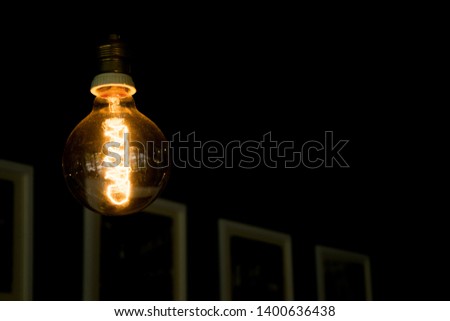 Old retro light bulb fluctuating light