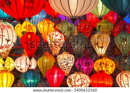 Many Colorful Light of Vietnam lantern hanging on the wall at hoi an ancient old town is UNESCO World Heritage Sites in Hoi An , Vietnam - Texture Background                                