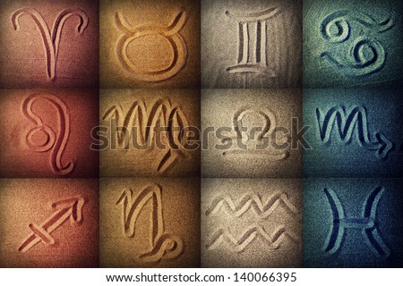 Horoscope signs written in the sand