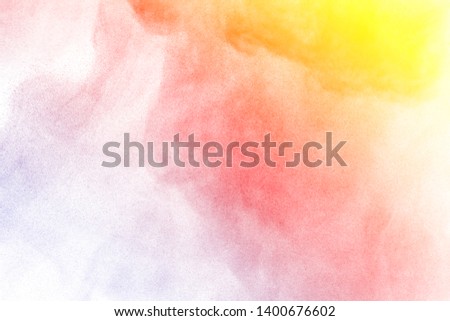 Explosion of colored powder, isolated on white background.
