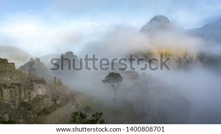 Most of the time, fog adds drama to a picture. Here early in the morning in Machu Picchu / Peru