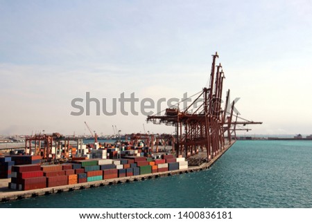 Cargo terminal for transshipment of grain, containers and other cargoes. Jeddah Port, Saudi Arabia. December,2018. Royalty-Free Stock Photo #1400836181