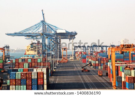 Cargo terminal for transshipment of grain, containers and other cargoes. Jeddah Port, Saudi Arabia. December,2018. Royalty-Free Stock Photo #1400836190