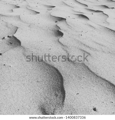 Minimalistic pictures of sand on the beach looking like desert