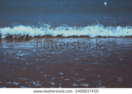 High contrast sea shore. Sea wave. 