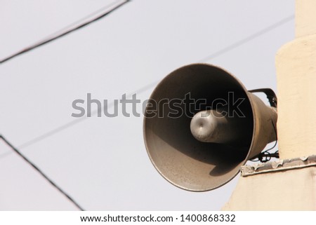 Loudspeaker on the old building. Information and communication