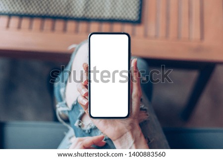mockup image cell phone blank white screen for text.using mobile.hand holding texting message chatting with friend.concept for modern communication in the business financia