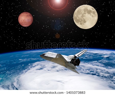 Moon and Mars in outer space. Spaceship goes anywhere. Space concept. The elements of this image furnished by NASA.
