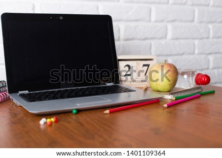 Modern classrom in school with laptop