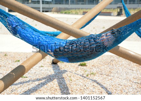 boy resting in a hammock