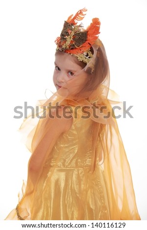 Emotional little girl in a fun fancy dress
