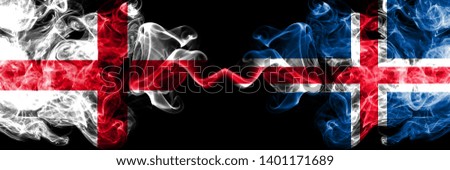 English vs Iceland, Icelandic smoky mystic flags placed side by side. Thick colored silky smokes flag of England and Iceland, Icelandic.