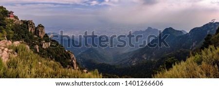 Panoramic view from Tai Shan ("Mount Tai"), one of the Chinese "Five Great Mountains" of Daoism. In the dust of the valley lies the city of Tai'an - Panorama from 7 pictures