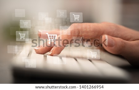 Business woman hand typing on keyboard with online shopping concept Royalty-Free Stock Photo #1401266954