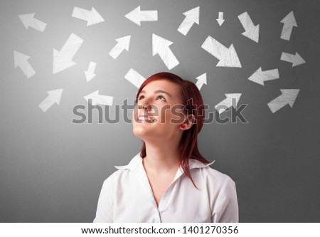 Business person choosing between several directions