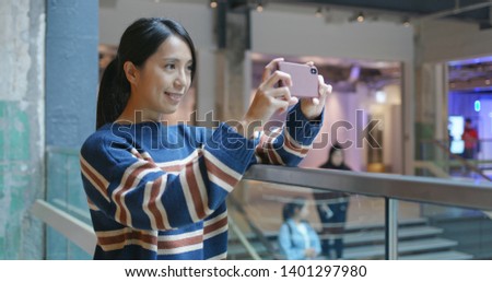 Tourist visit Hong Kong and use of mobile phone to take photo