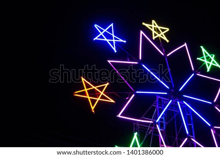 The colorful ferris wheel in night