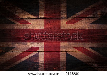 A abstract grunge British flag on oak boards. British flag on oak.