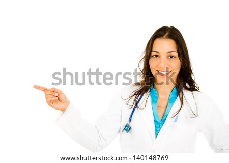 Smiling woman doctor pointing with finger to copy space isolated on white background