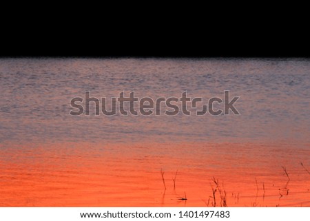 dawn light reflect on water